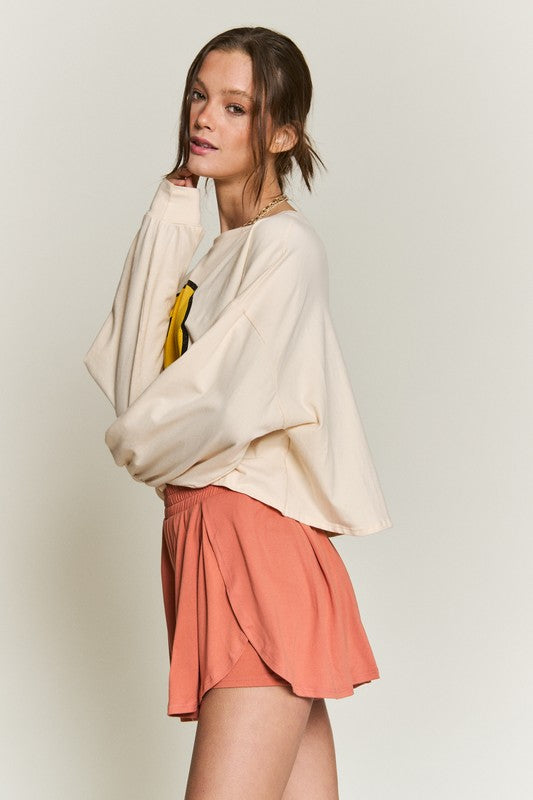 Stilla | Ansigt Langærmet Crop Top